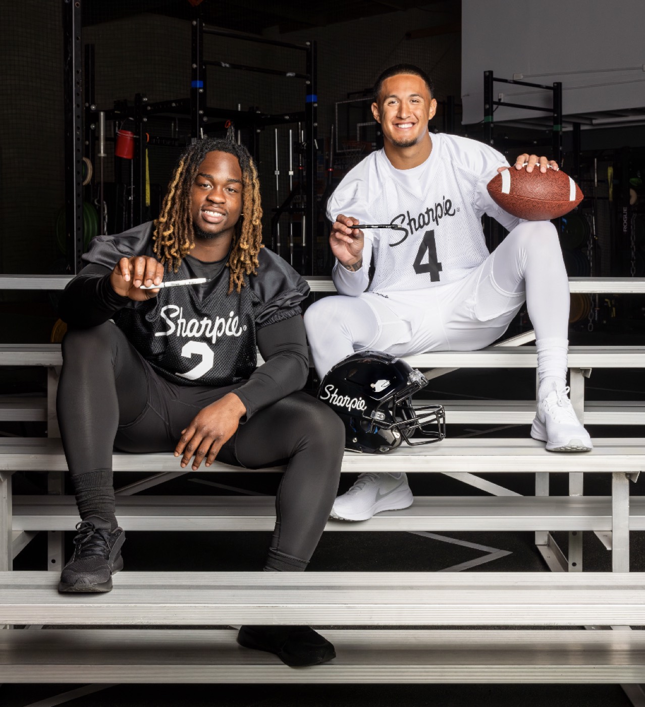 Year 2 rookies in custom Sharpie jerseys posed on bleachers